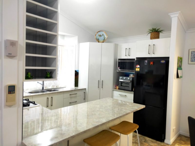 Relaxed Living in a Private Village Oasis