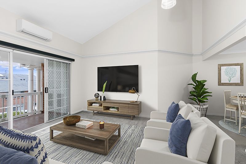 Perfectly located, renovated unit with easy ramp access and lovely district views.