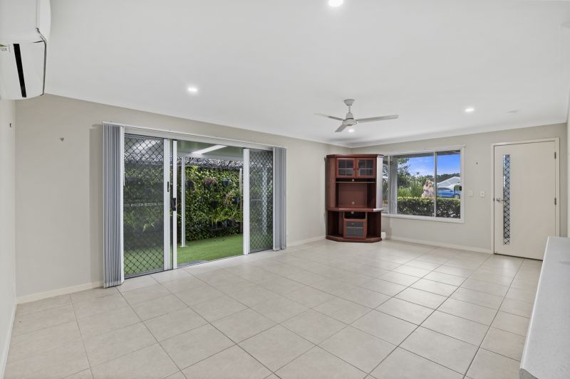 Lush Garden Views & Carefree Living!