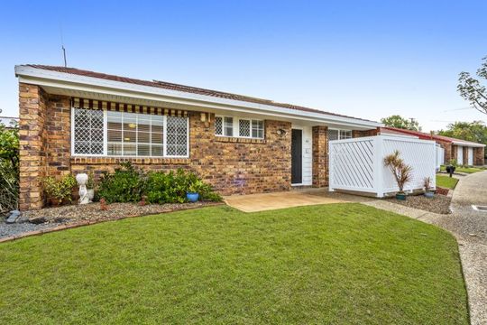 Beautiful two-bedroom, one bathroom villa with covered rear entertaining area.