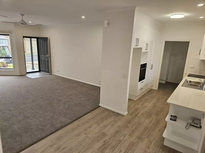 2 Bedroom + Sunroom and QLD room. North facing Lounge.