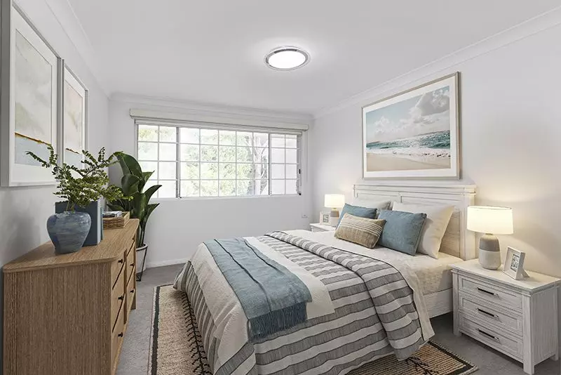 Exquisitely maintained and conveniently located sun-filled unit