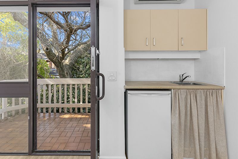 A private and quiet retreat overlooking lush green gardens. 