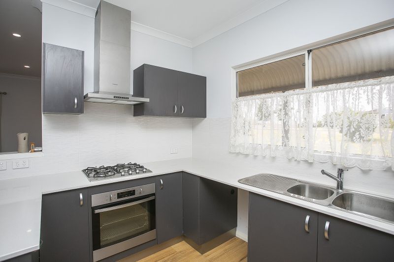 Front & Centre! 2 bed, 2 bath plus study with beautiful pond views