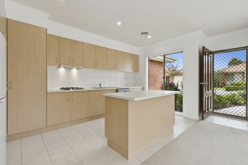 Enjoy serene living in this modern two-bedroom villa