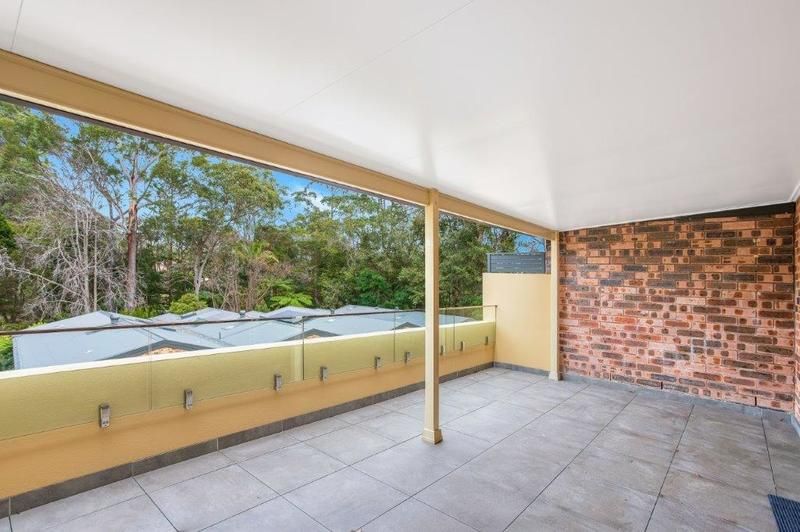 Modern Living with Sunroom and Entertainer’s Balcony