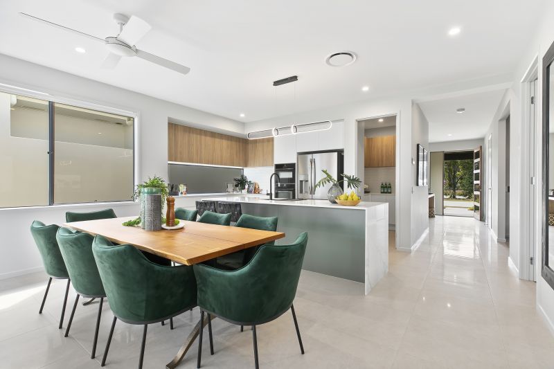 STUNNING DISPLAY HOME FACING TRANQUIL LAKE