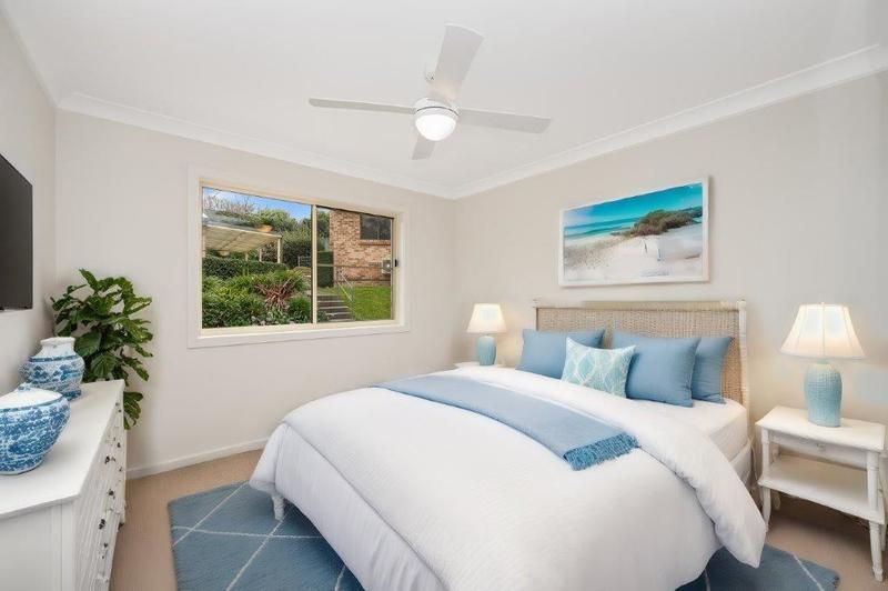 Modern Living with Sunroom and Entertainer’s Balcony