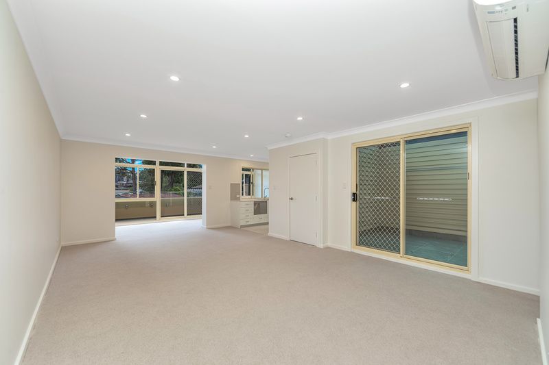 Light-Filled Home with Sunroom and Space to Live