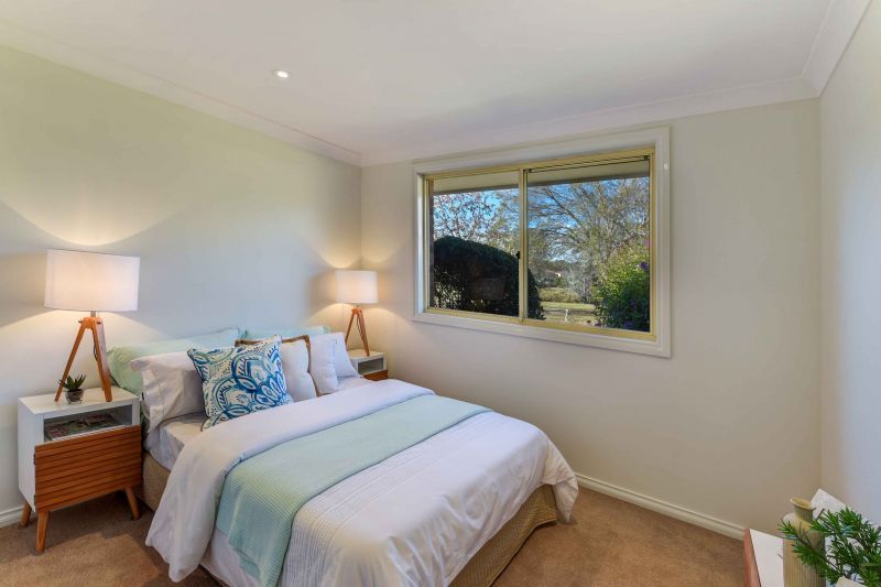 Sit back and relax on your patio! Looking onto the parkland enjoying the lifestyle here at Tarragal Glen!