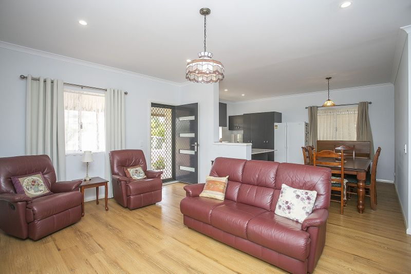 Front & Centre! 2 bed, 2 bath plus study with beautiful pond views