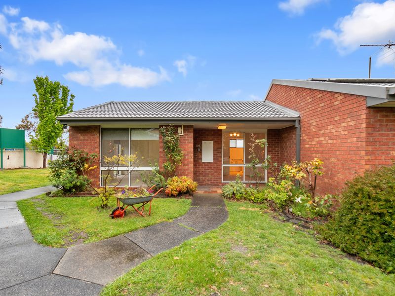 Private, Updated Unit with Courtyard in a Friendly Village Setting