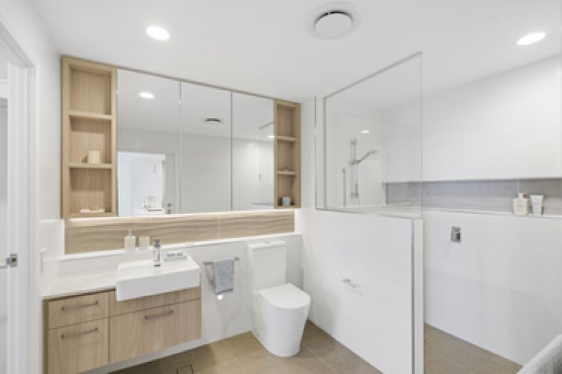 Light-filled north-facing terrace with bowling green views