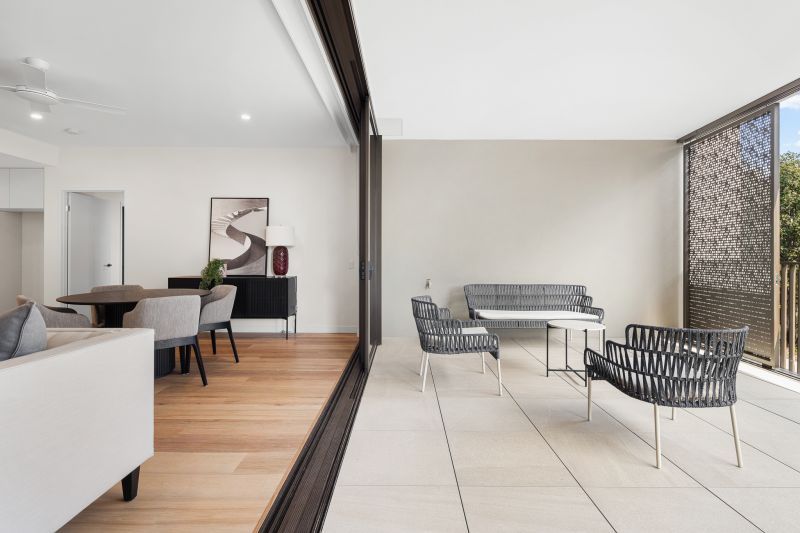 Enjoy a large balcony overlooking the village gardens