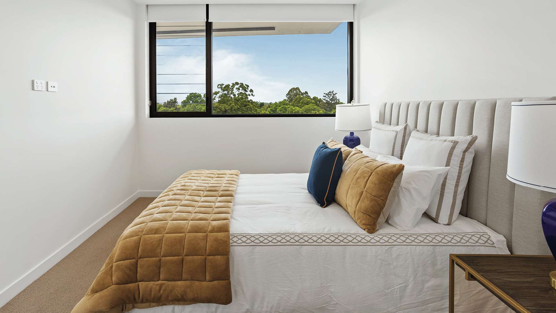 Spacious courtyard apartment surrounded by established gardens