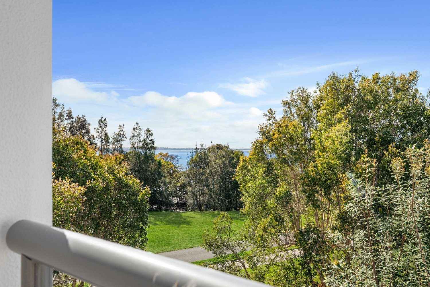 Spacious Three-Bedroom Apartment with Bayside Balcony View