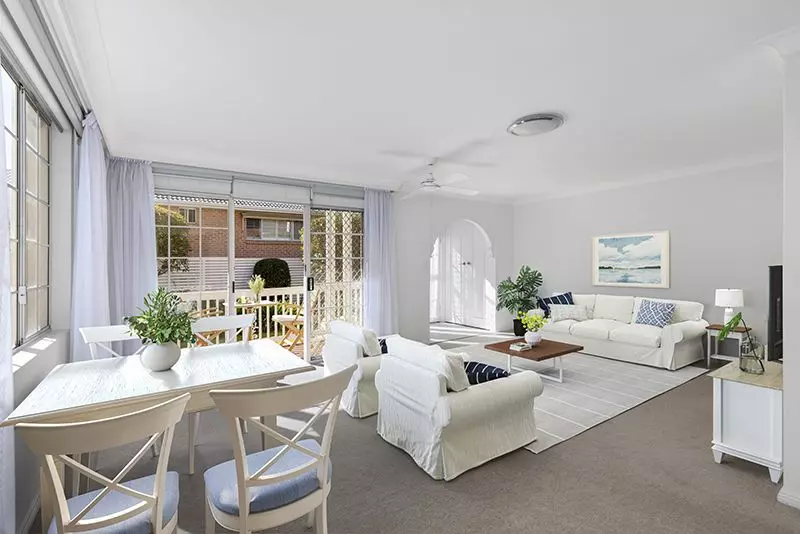 Centrally located, impeccably presented ground floor unit with large rear sunny garden courtyard.