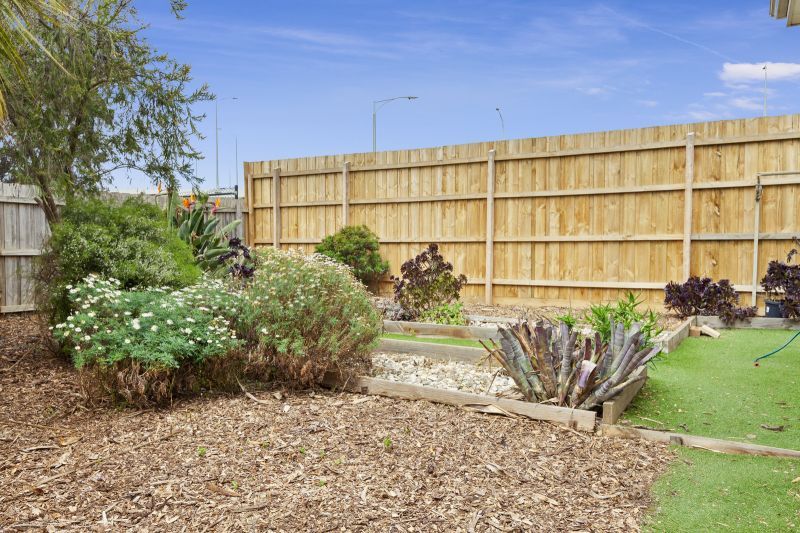 Charming Two-Bedroom Home with Beautiful Gardens