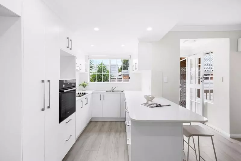 Fully renovated, contemporary style 3 bedroom unit with garden surrounds.