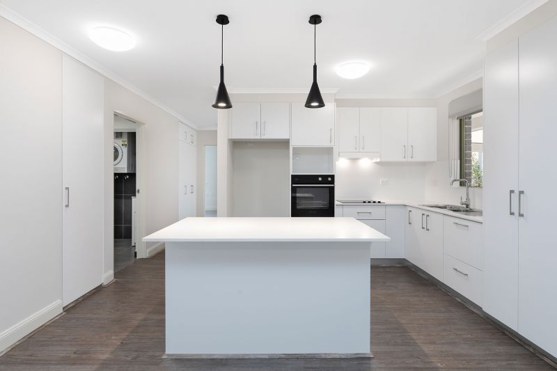 Stylishly refurbished garden style unit with level access throughout, close to all amenities