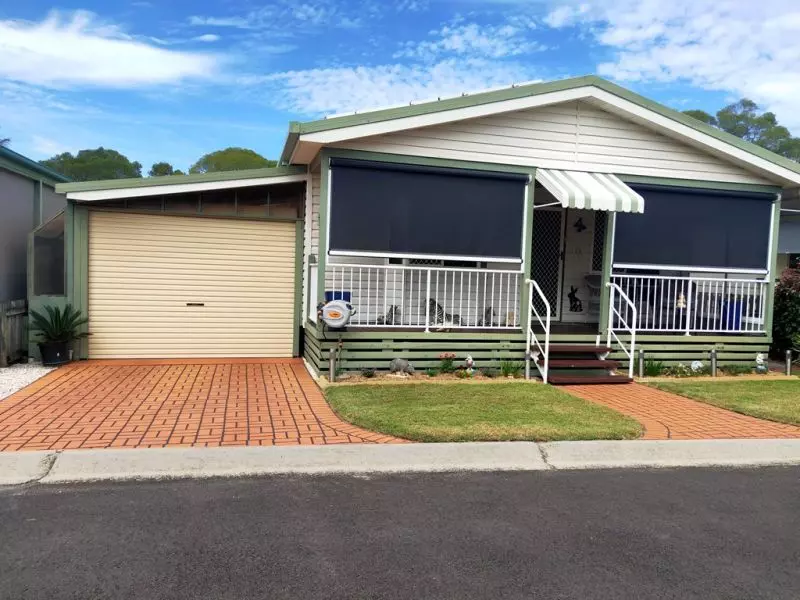 Relaxed Living in a Private Village Oasis