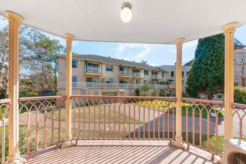 ELEVATED OVERLOOKING THE WELL MANICURED GARDENS