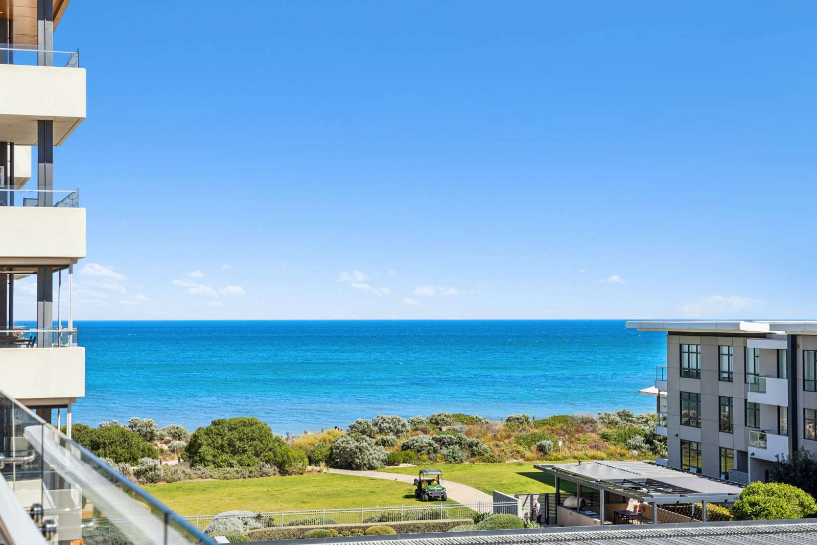 Experience exclusive beachfront living in this luxurious apartment, with breathtaking views from the hills to the sea, within this secure community