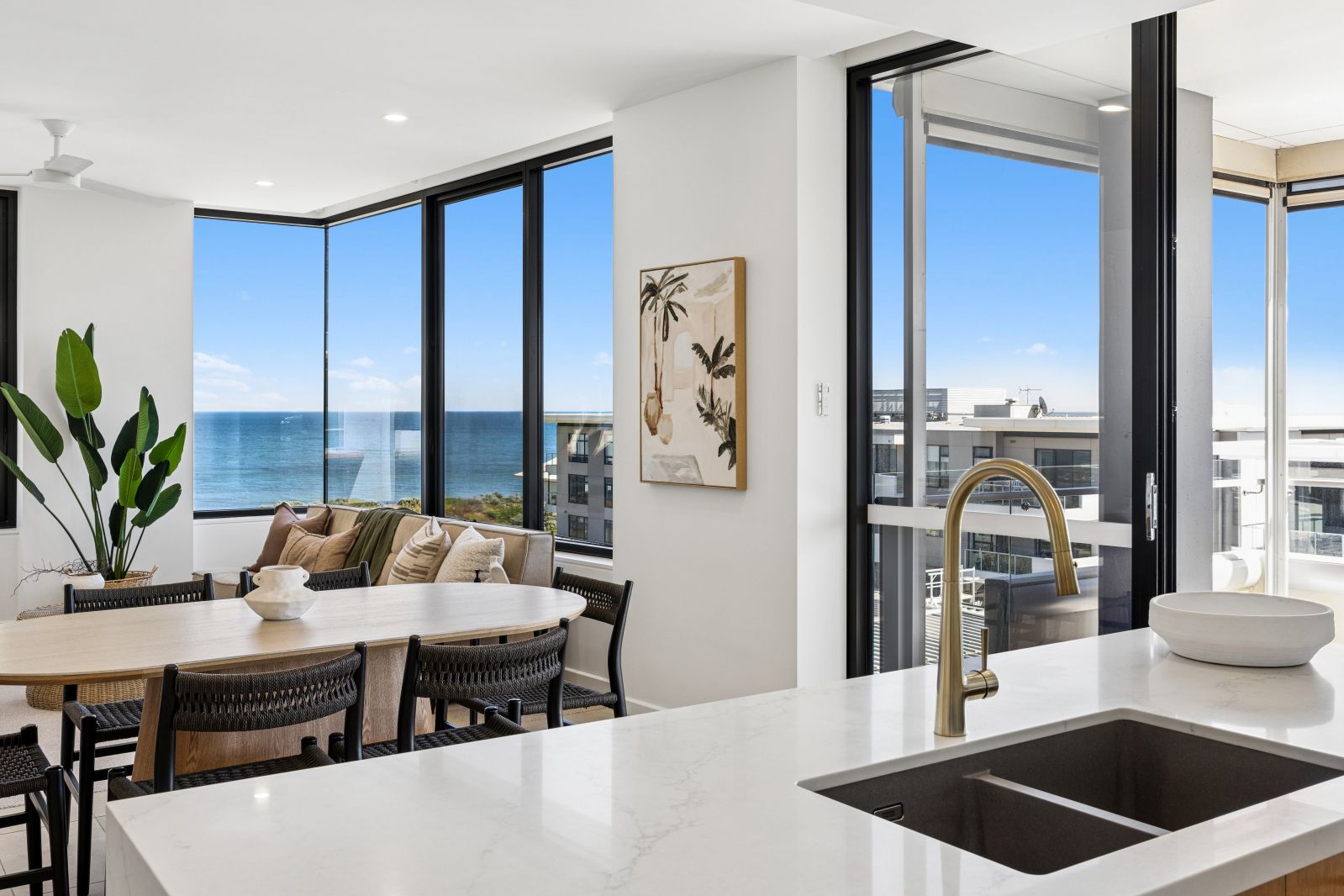 Experience exclusive beachfront living in this luxurious apartment, with breathtaking views from the hills to the sea, within this secure community