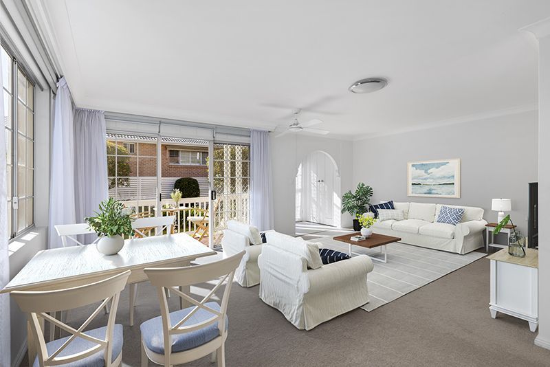 Centrally located, impeccably presented ground floor unit with large rear sunny garden courtyard.