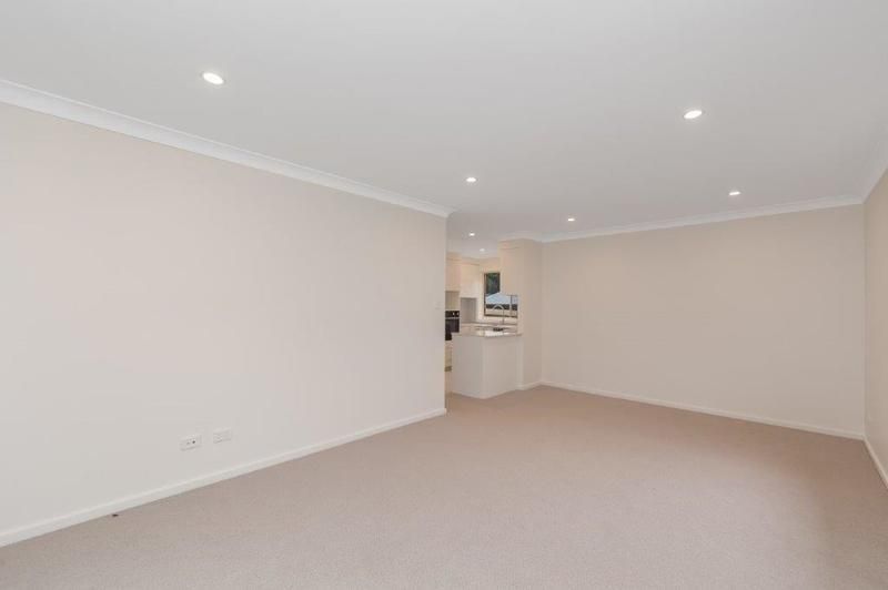 Modern, Spacious Living with Large Sunny Courtyard and Single Garage