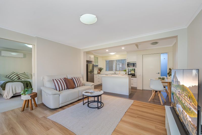Secure Parking, Low Maintenance Unit Ground Floor Living with Modern Finishes!