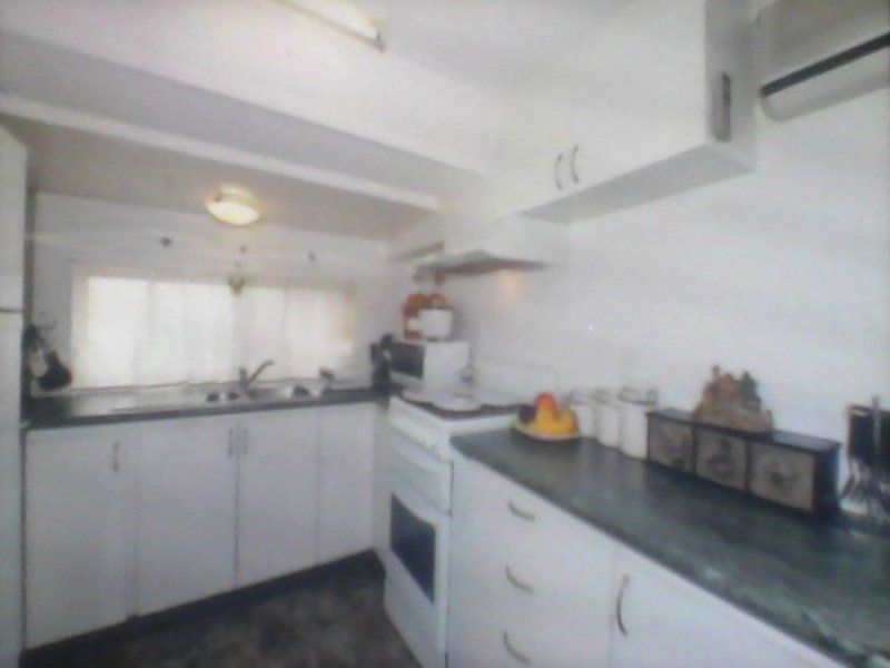 Lovely sunny 2 bedroom home. Easy access into a  large carport.