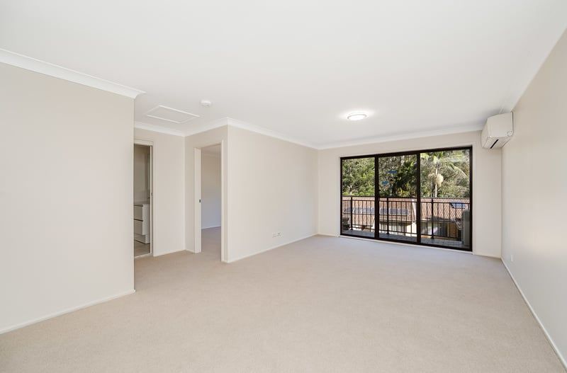 Modern and Stylish Living with a Balcony