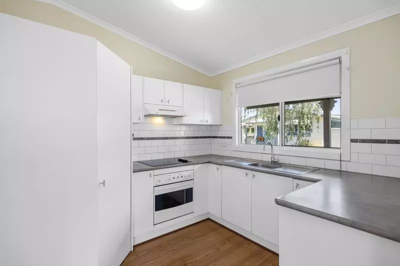 Corner Cottage with Spacious Backyard 
Affordable Lifestyle Opportunity