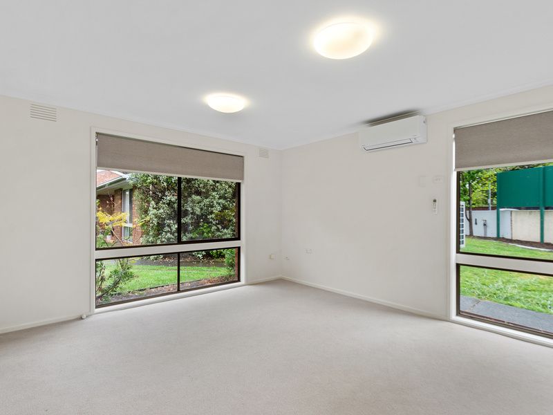 Private, Updated Unit with Courtyard in a Friendly Village Setting