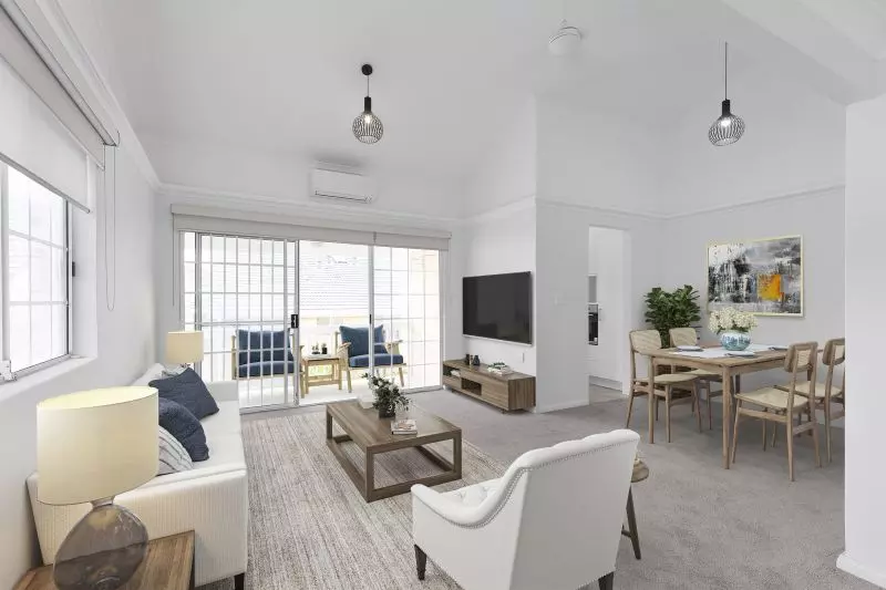 Exquisitely maintained and conveniently located sun-filled unit