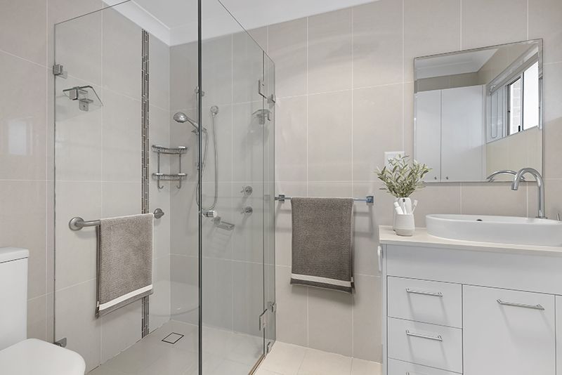 An elegant, fully renovated one-bedroom unit overlooking gardens.