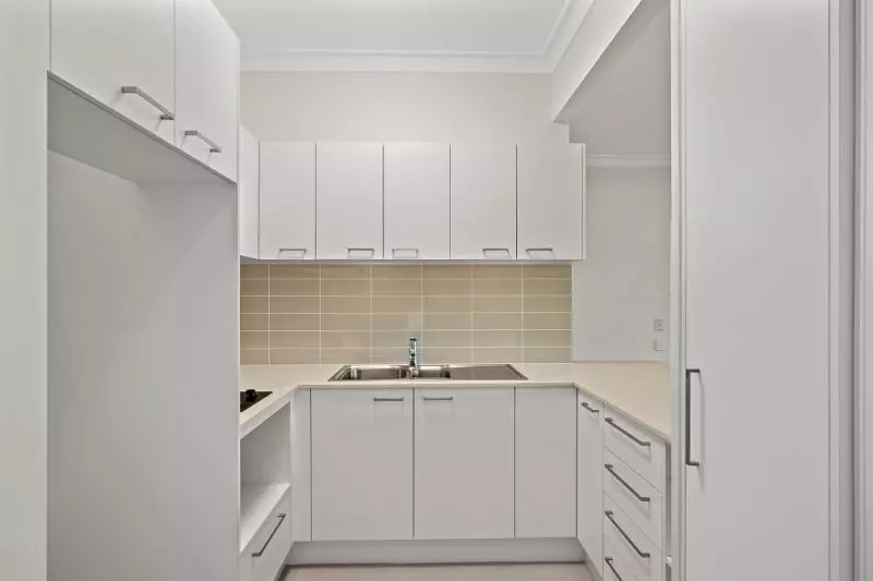Ground floor studio apartment with east facing enclosed balcony