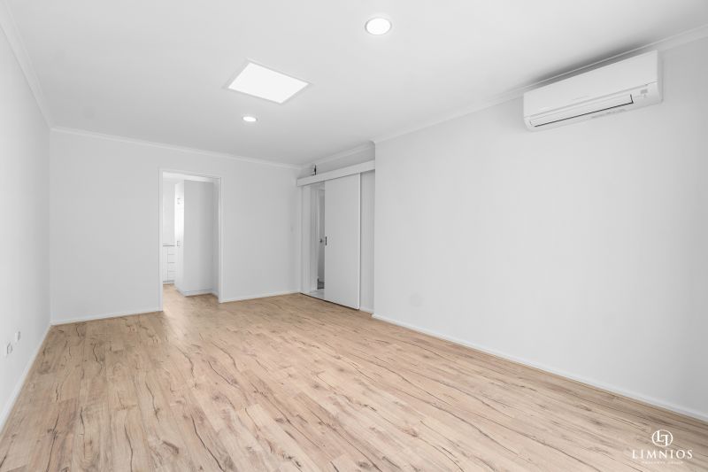 SOLD! A bright, light filled unit with a sunroom and leafy outlook