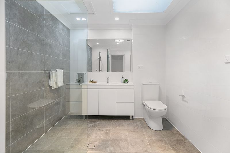 Gorgeously renovated 3 bedroom unit with modern look, level access and leafy district views.