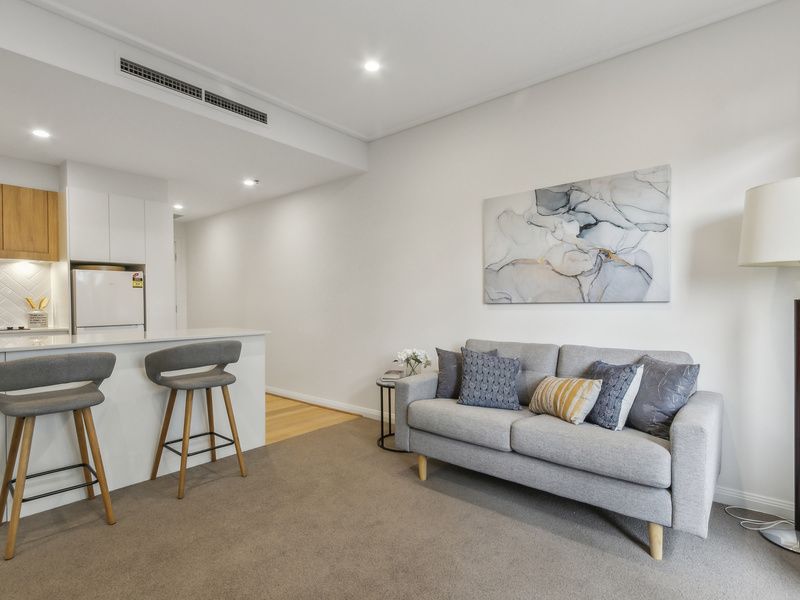 Stylish Retreat with Two Private Balconies and Modern Upgrades