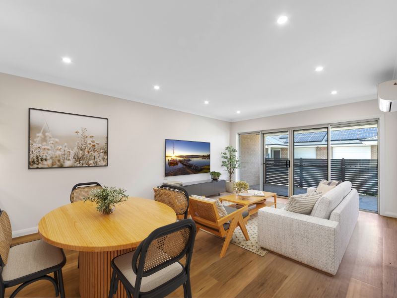 Open-plan two-bedroom villa with sun-filled alfresco area