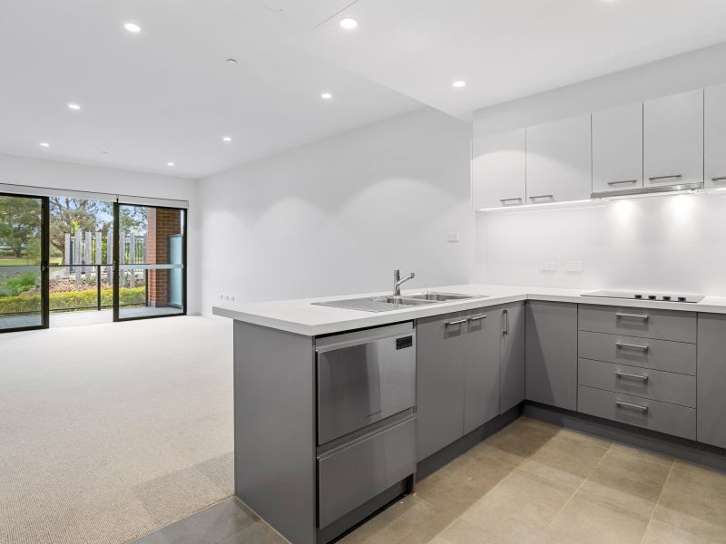 DEPOSIT TAKEN - Light-filled ground floor apartment with lagoon views!