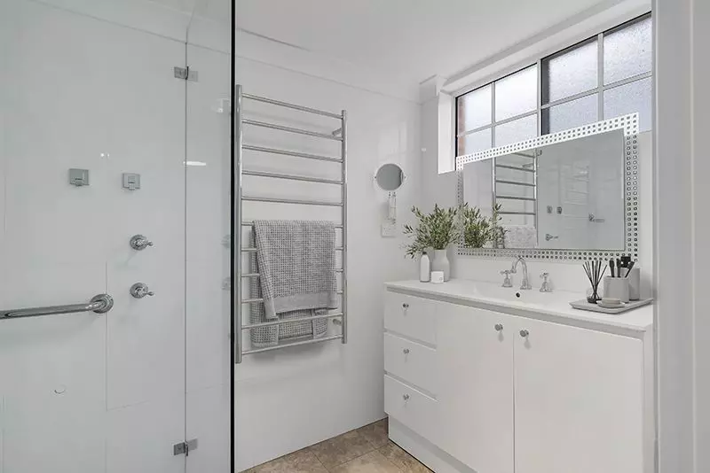 Elegantly renovated ground floor unit overlooking beautiful gardens close to clubhouse.