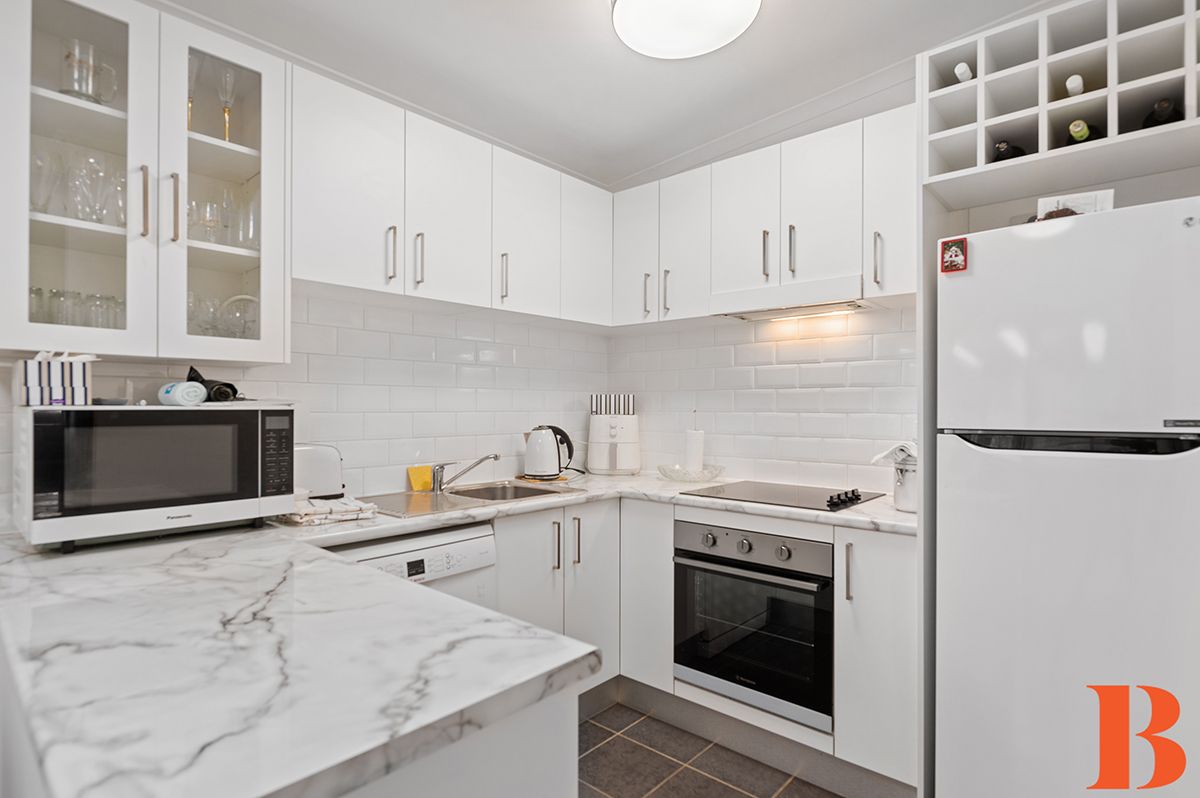 DEPOSIT TAKEN / UNDER CONTRACT - Perfect Presentation - Fabulous indoor/outdoor living room - convenient location