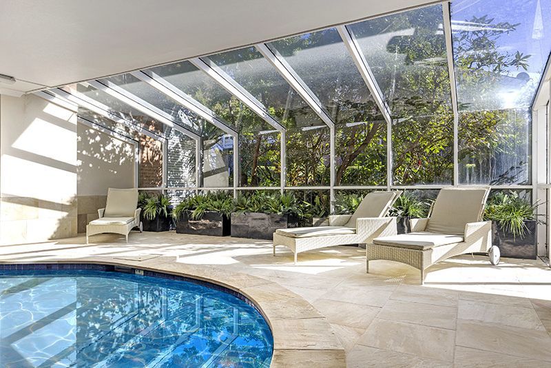 Elegantly renovated ground floor unit overlooking beautiful gardens close to clubhouse.