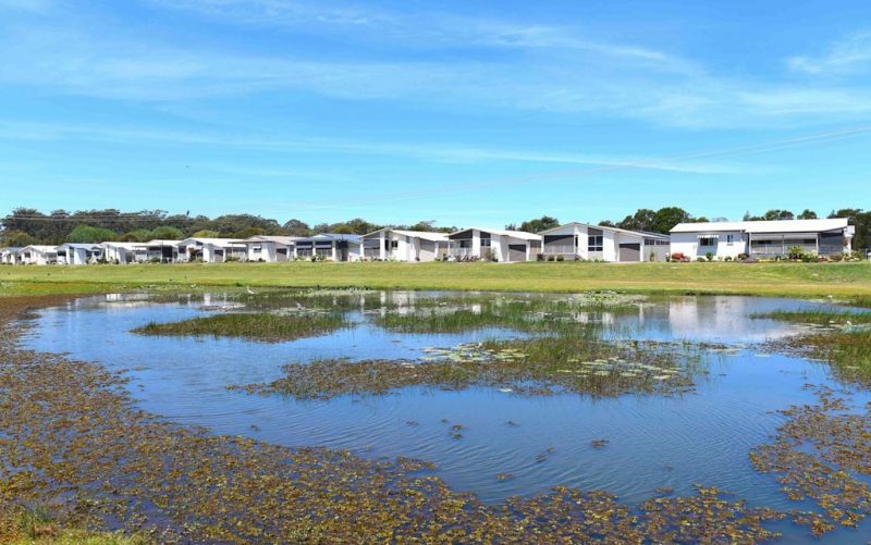 Surrounded by green space, a rare gem!