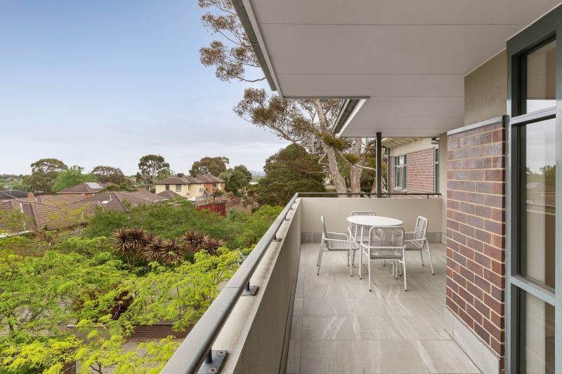 Courtyard-facing apartment on level 3 with serene views