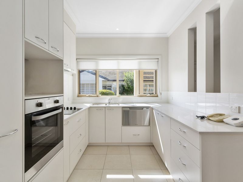 Beautifully Updated Unit with High Ceilings and Convenient Layout