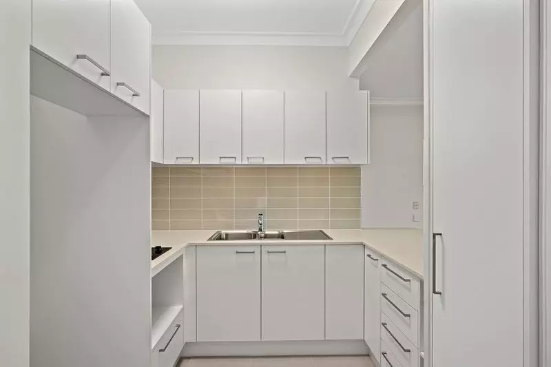 Ground floor studio apartment with East facing enclosed balcony